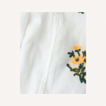 Cotton shirt embroidered with yellow flowers