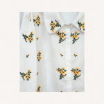 Cotton shirt embroidered with yellow flowers